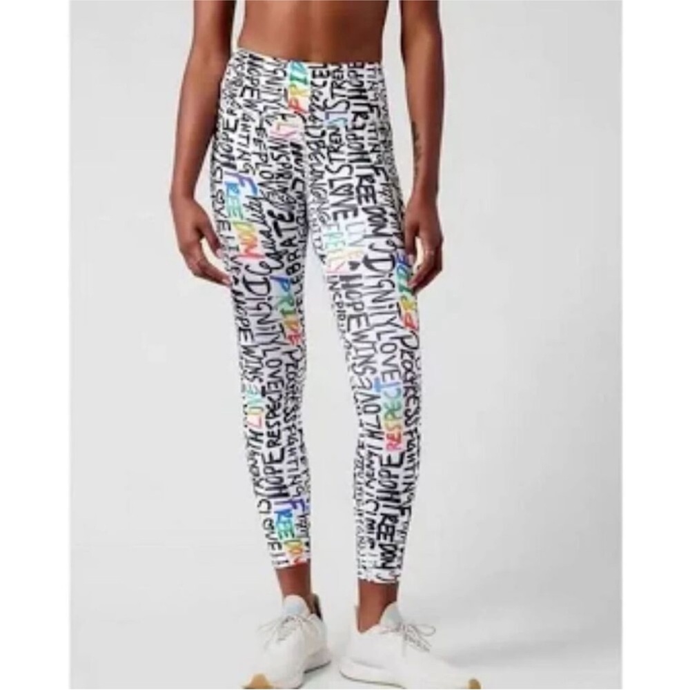 ATHLETA ELATION TRAIN 7/8 Tight Leggings PRIDE Graffiti words sz XXS